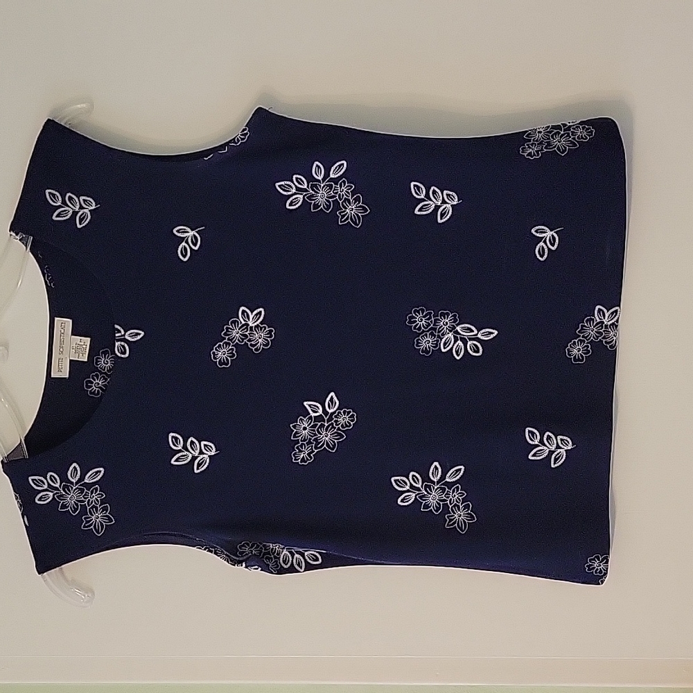 Petite Sophisticate navy blue with white embroidered flowers. Size P.